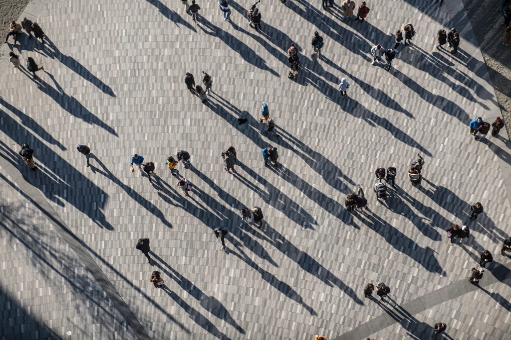 people-walking-and-conversing-in-public