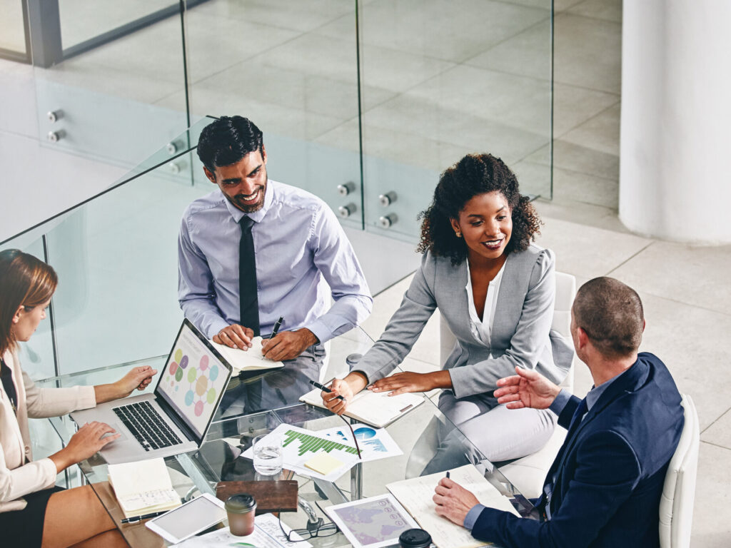 corporate-employees-working-together-on-financials