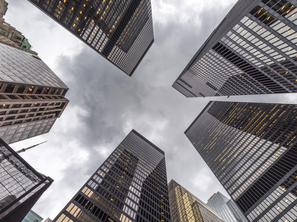 low-angle-shot-of-real-estate-buildings-and-cloudy-sky