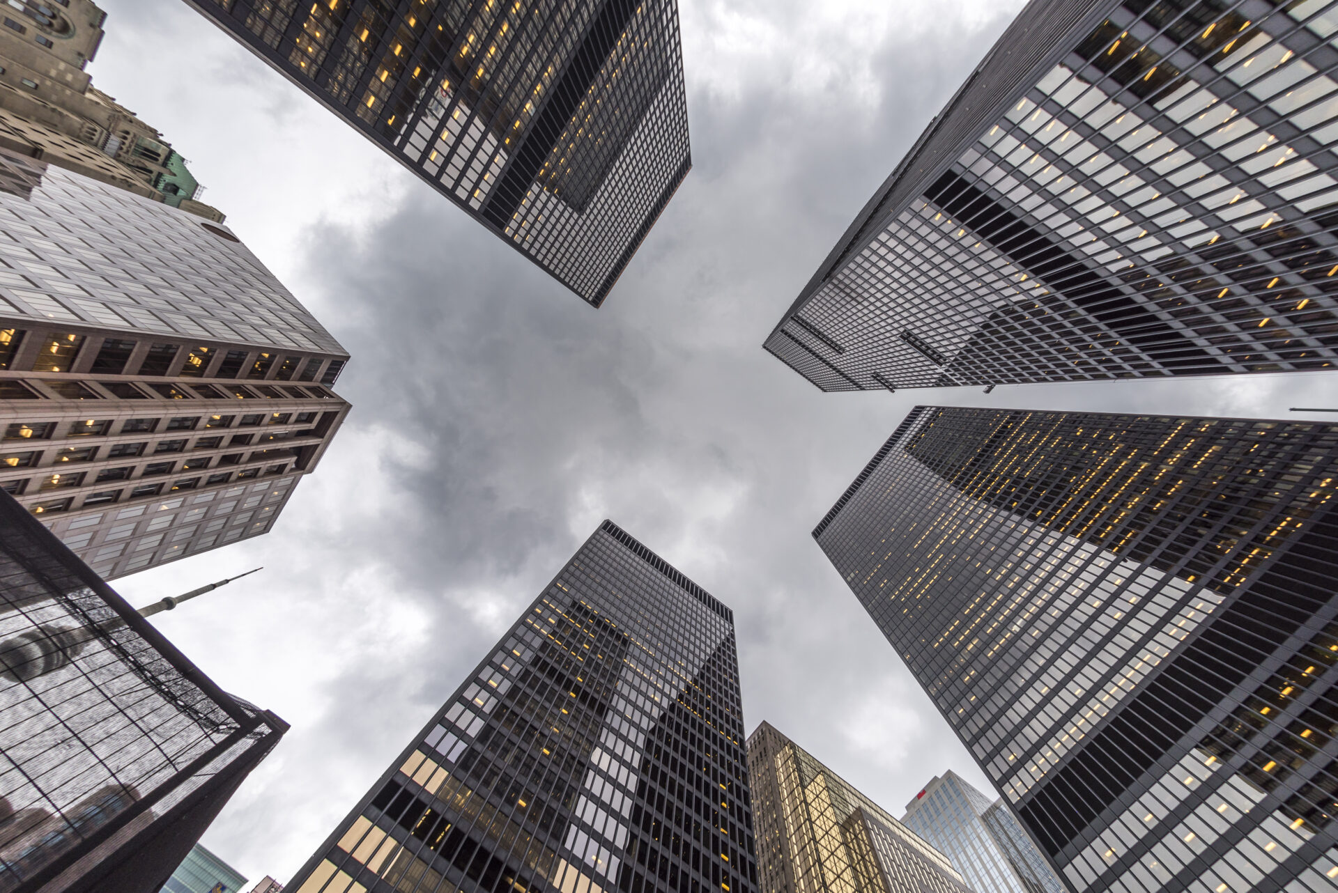 low-angle-shot-of-real-estate-buildings-and-cloudy-sky