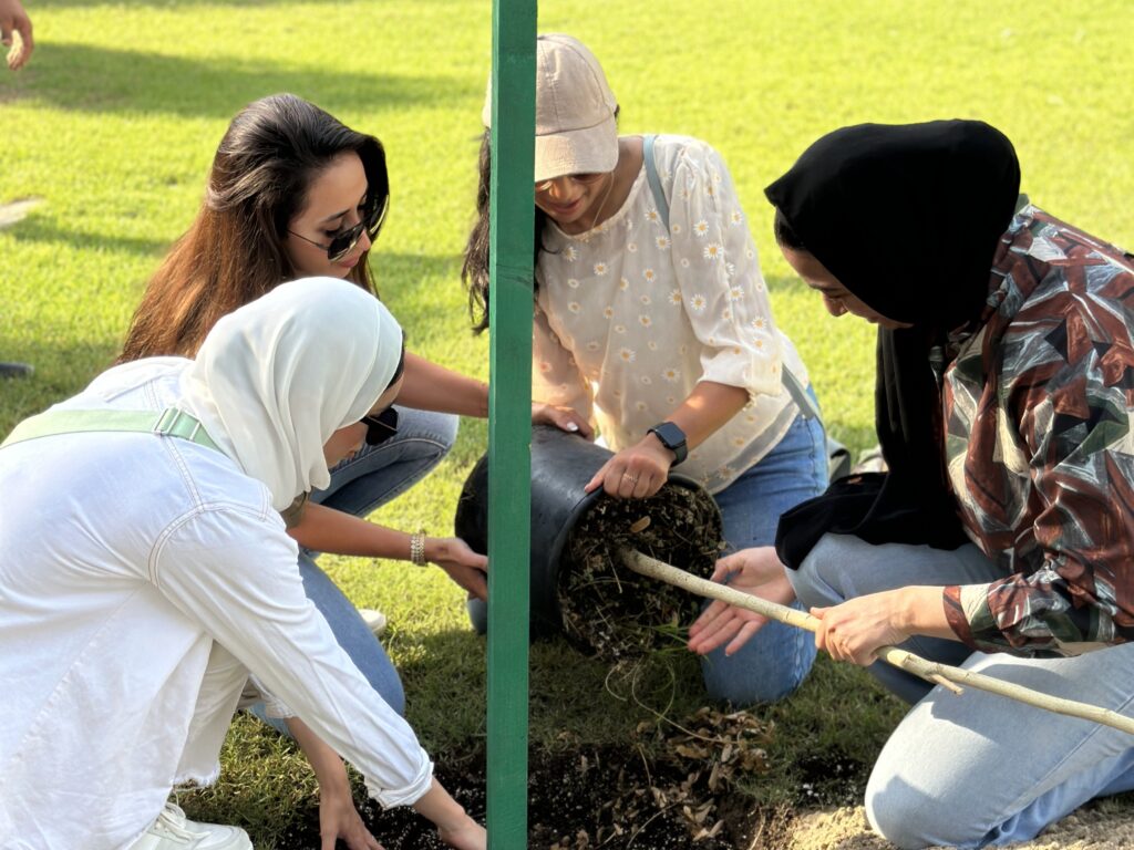 Reso team planting trees for social impact